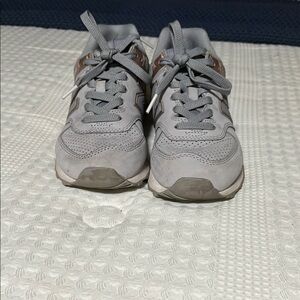 Women’s  Gray and Rose Gold New Balance 574 Sneakers
